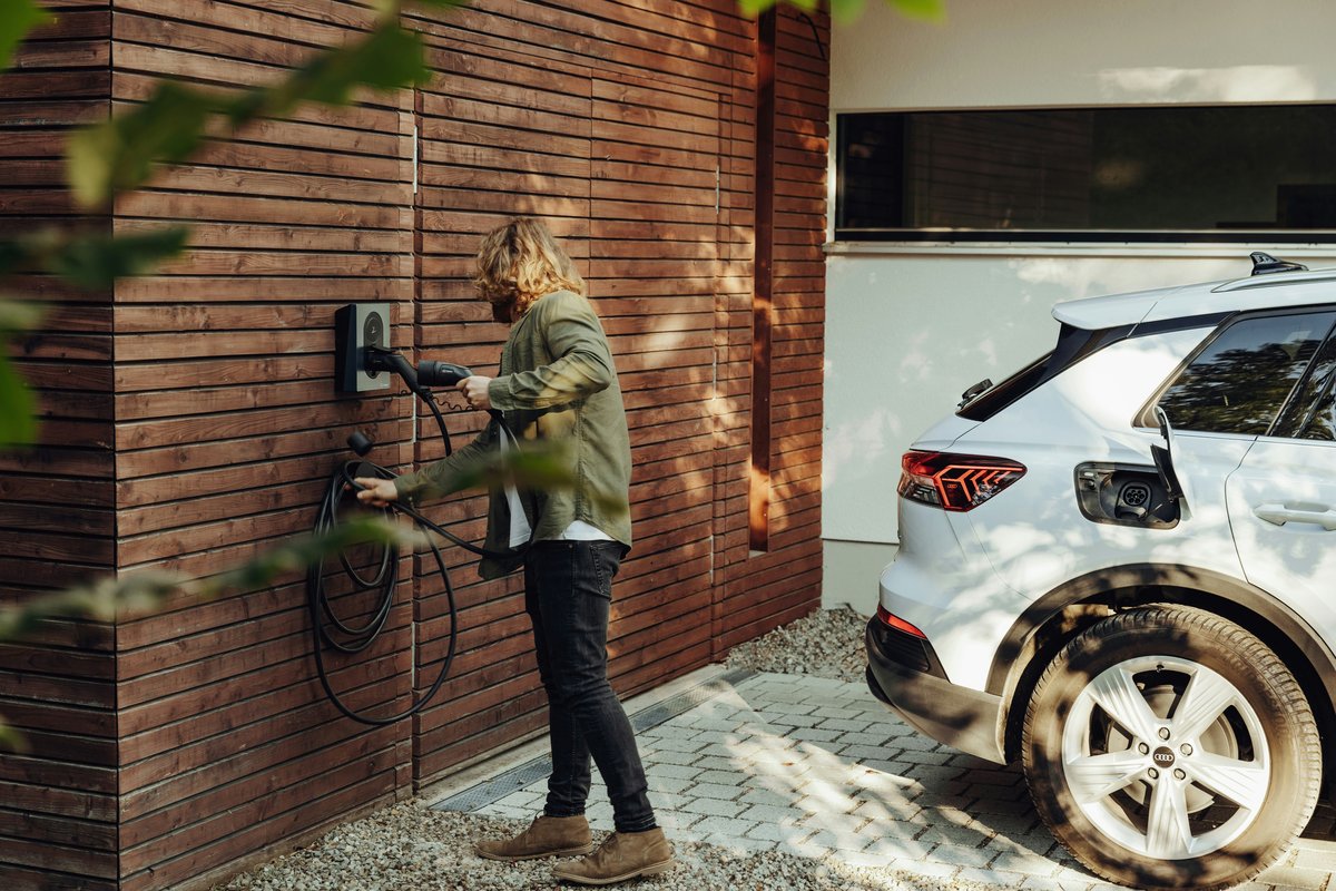 EV charger installed in a home garage by Archvolt Electric in Lexington KY
