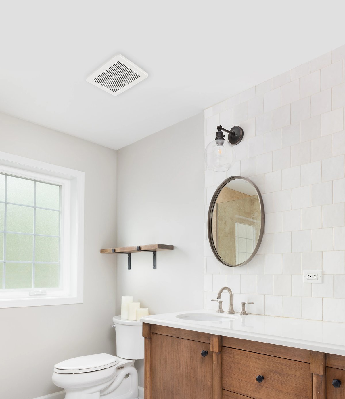 Quiet bathroom exhaust fan installed in ceiling by Archvolt Electric